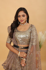 Taupe & Gold Premium Faux Georgette Heavy Embroidery, Zari, Coding & Sequins Work Designer Lehenga Choli with Net Dupatta Set