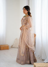 Mauve & Gold Premium Soft Butterfly Net Heavy Embroidery and Sequins Work Designer Lehenga Choli Set